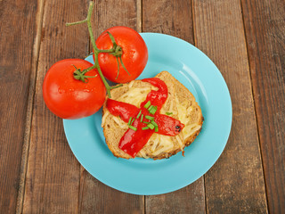 Sandwich with tomatoes on a plate