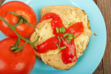 Sandwich with tomatoes on a plate