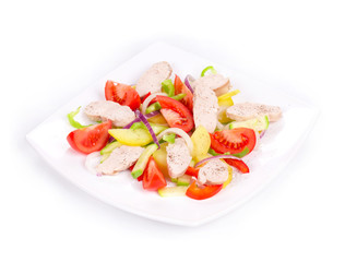 Warm meat salad with vegetables