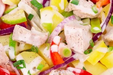 Warm meat salad with vegetables