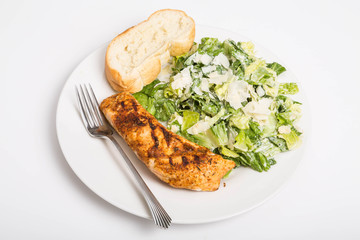 Baked Salmon with Bread and Caesar Salad