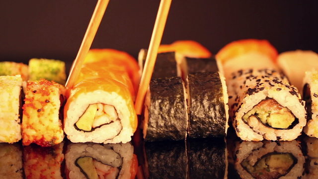 Sushi pieces in row in slide motion
