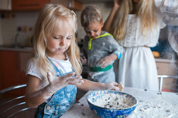 mother and children playing