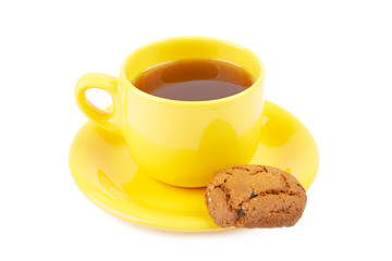 Cup of tea and chocolate cookies on a white background isolated