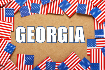 The title Georgia with a border of USA flags