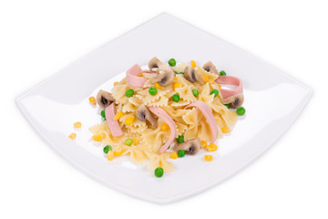 Pasta farfalle with ham and mushrooms.