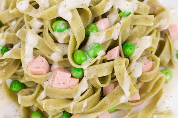 Pasta tagliatelle with green peas