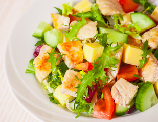 fresh vegetables salad with chicken and cheese