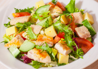 fresh vegetables salad with chicken and cheese
