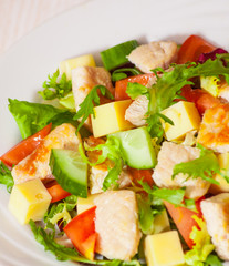 fresh vegetables salad with chicken and cheese