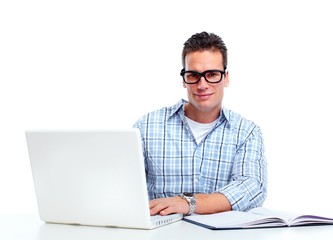 Man working with laptop computer.