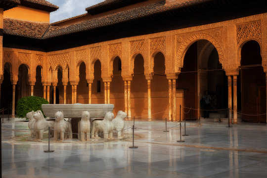 Alhambra de Granada: The Court of the Lions at sunset