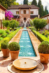 Alhambra de Granada. Generalife's fountain and gardens - obrazy, fototapety, plakaty