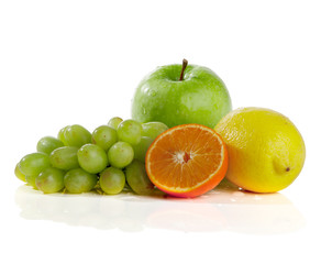 Apple, orange, lemon, grape, on a white background