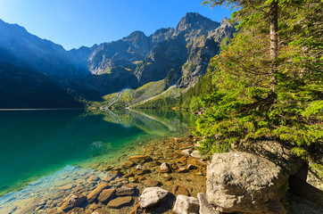 Naklejka na ściany i meble Green water mountain lake Morskie Oko, Tatra Mountains, Poland