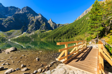 Footbridge on trail by Morskie Oko lake, Tatra Mountains, Poland - obrazy, fototapety, plakaty