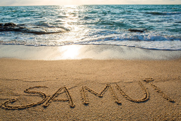 Samui written on the sand