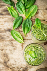 Smoothie with banana and spinach in a glass