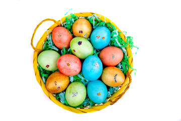 multicolored Easter eggs in a basket