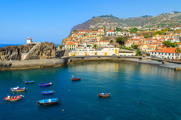 Fototapeta na wymiar View of Camara de Lobos fishing village and port, Madeira island