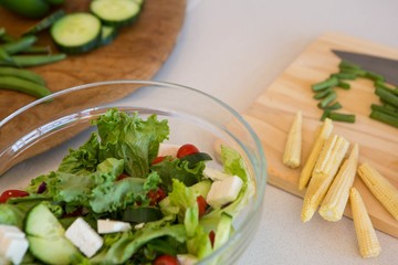 Salad and vegetables on table