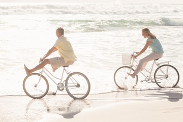 Happy couple on a bike ride