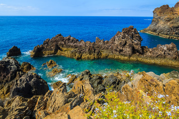 Fototapeta na wymiar View of rocks on coast of Madeira island in Funchal, Portugal