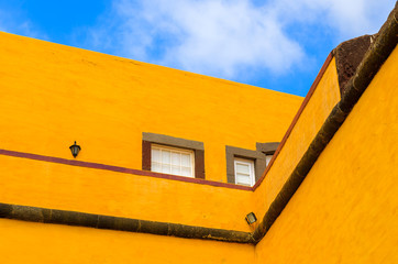 Yellow buildings of Sao Tiago castle in Funchal, Madeira island