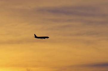 Fototapeta na wymiar Silhouette of an airplane