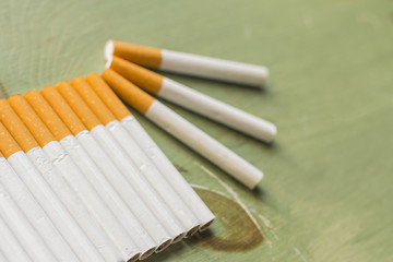 Cigarettes on Grunge Wood