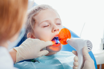 Dentist ultraviolet light equipment. Child.