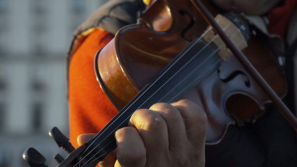Violin in the city. Find similar clips in our portfolio.
