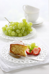 Piece of tangerine cake with fruits