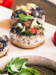 Stuffed champignons with eggs, cheese and paprika.
