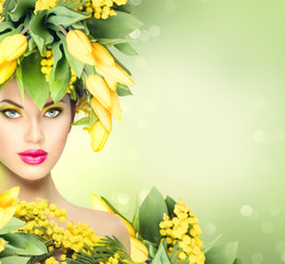 Beauty spring model girl with flowers hairstyle