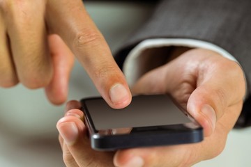 Businessman using his smart phone