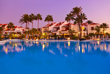 Swimming pool at sunset