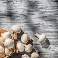 Mushrooms on wooden table, top view