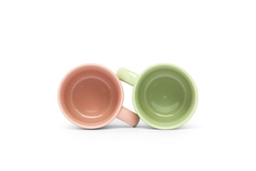 Pink and green coffee cup on white background