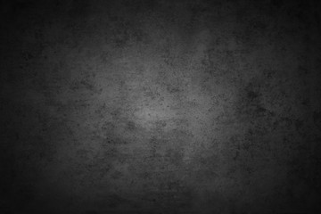 Grey stone concrete cement wall background. Dark edges