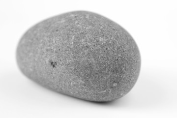 One rock on plain background