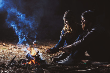 Couple tent camping in the wilderness