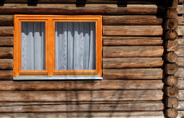 Obraz na płótnie Canvas window log cabin