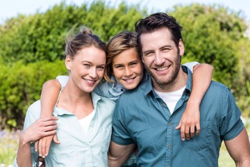 Obraz premium Happy family smiling at camera