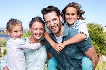 Happy parents with their children