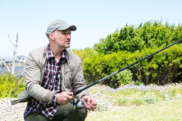 Happy man fishing