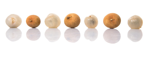 Longan fruit over white background