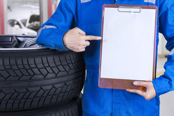 Technician showing empty paper