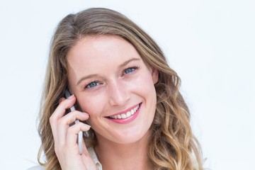 Fototapeta premium Smiling woman looking at camera