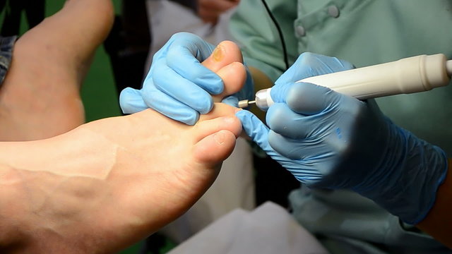 pedicure (nails polishing) in beauty salon